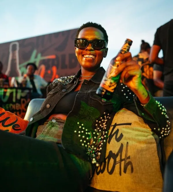 Musician Azawi shows off her Guiness Smooth at the Make It Yours launch