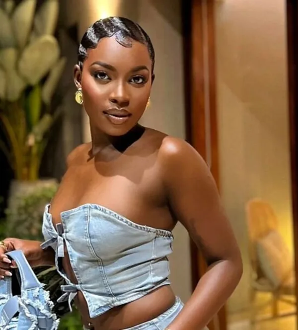 Dance Mamweta attending an event in Kampala.