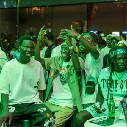Revellers at neon rave