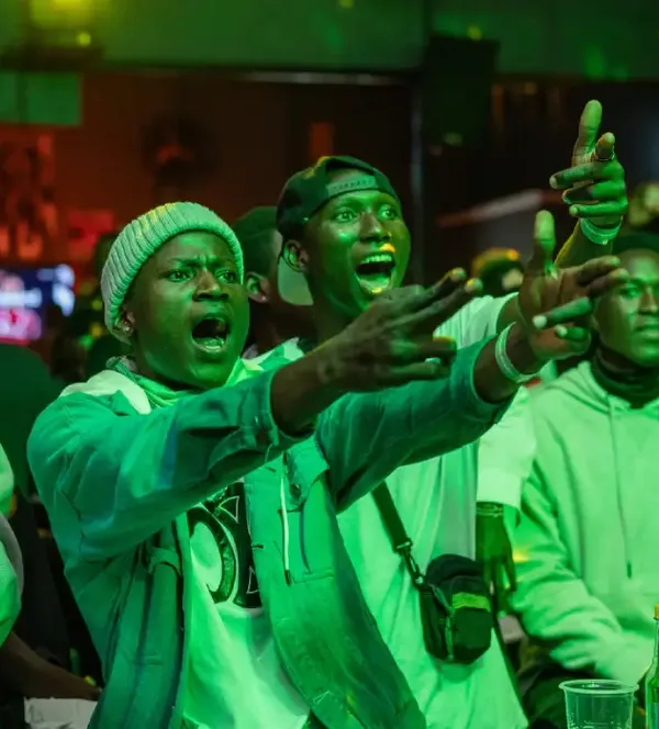 Revellers at neon rave