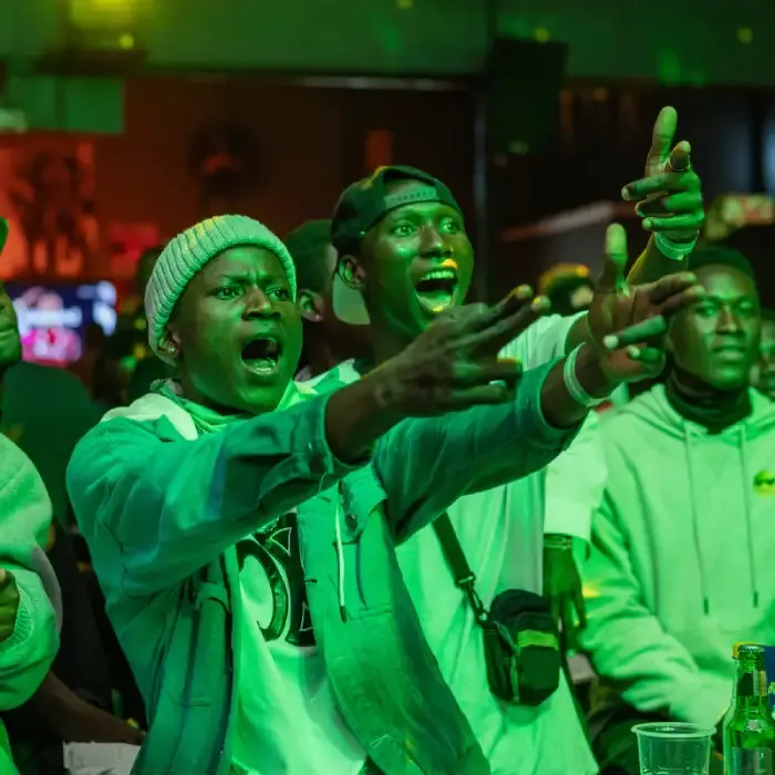 Revellers at neon rave