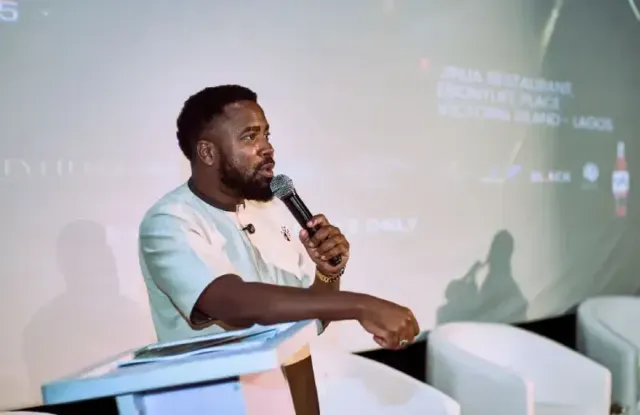 Reach A Hand Uganda CEO Humphrey Nabimanya speaking at the event