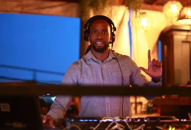 DJ Byran playing at Dim The Lights Cafe Naalya