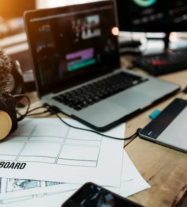 content-creation-kit-laptop-camera-worksheet-on-table