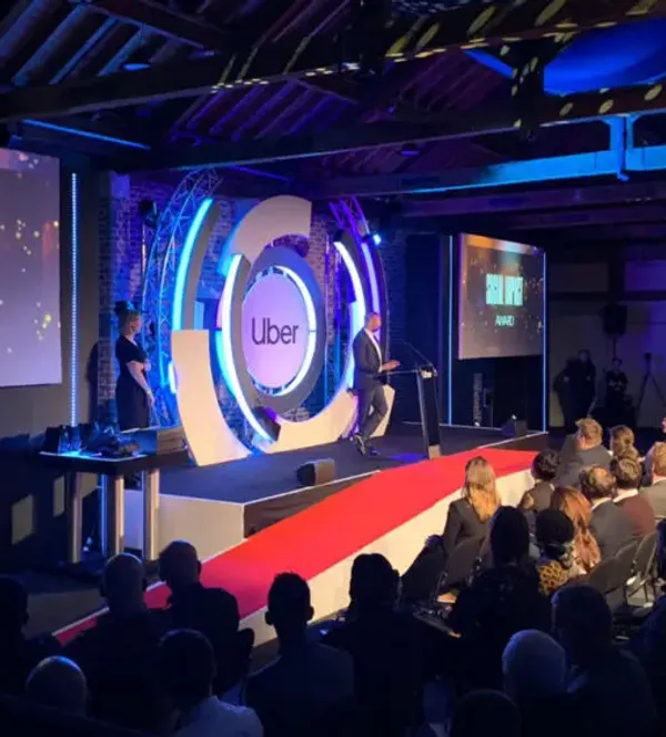 audience-in-an-auditorium-with-speaker-on-stage